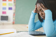 © JGI/Jamie Grill/Blend Images - Black student studying in classroom