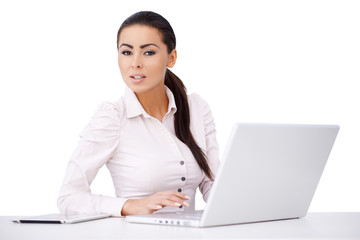 Wall Mural - Proffesional worker sitting in front of compurer