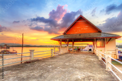 Fototapeta na wymiar Sunrise at the harbor of Koh Kho Khao island, Thailand