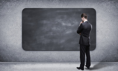 Sticker - man looking at blackboard