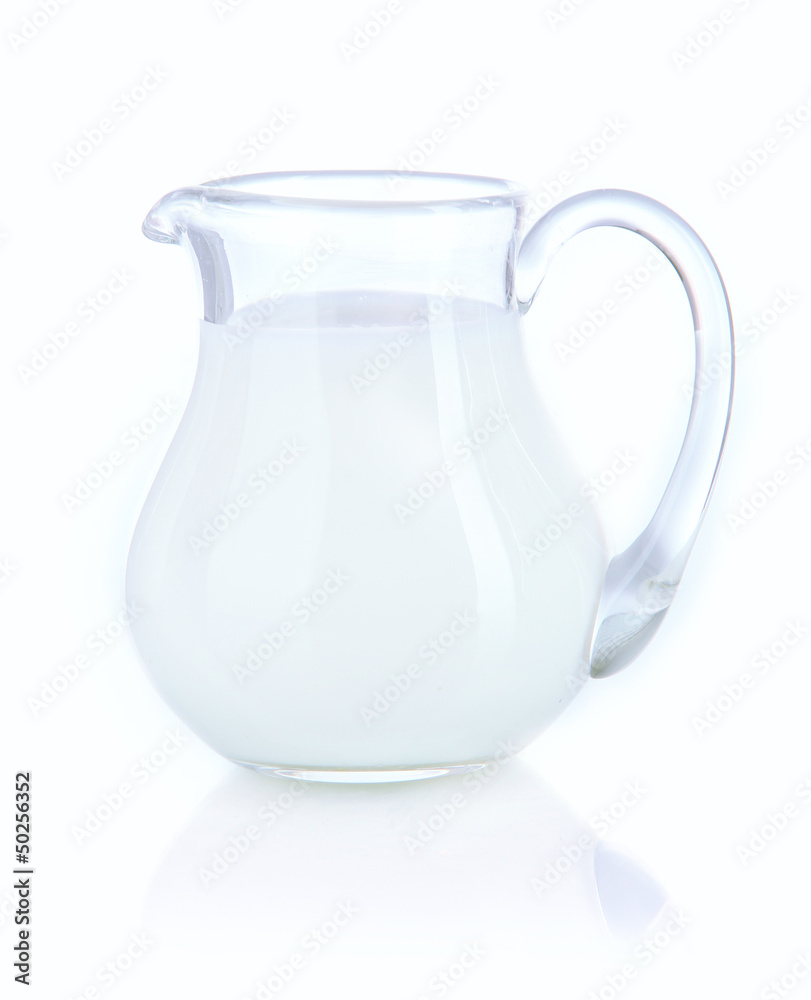 Pitcher of milk isolated on white