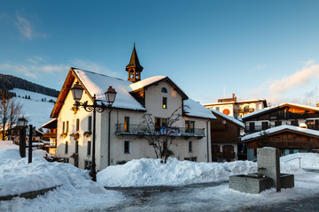 Fototapete - Evening in the Village of Megeve in French Alps, France