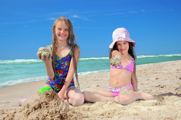 children playing on beach