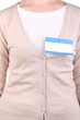 © Africa Studio - Blank nametag on girl's clothes close up