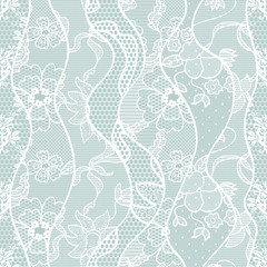 Lace seamless pattern with flowers on blue background