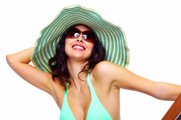 Wall Mural - Woman relaxing on the beach.