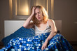 © listercz - young caucasian woman in bed with headache and hangover
