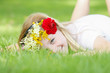 young girl with floral wreath outdoor smiling