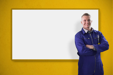Poster - Mechanic standing in front of a white screen on yellow backgroun