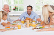© WavebreakmediaMicro - Happy family at thanksgiving