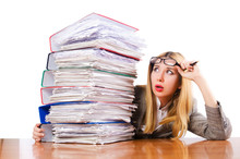 Busy Woman With Stacks Of Paper
