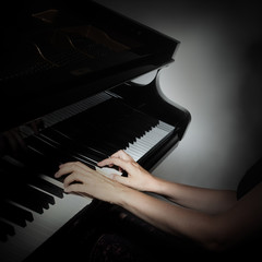 Piano keys pianist hands playing