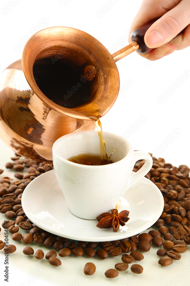 Cup and pot of coffee and coffee beans, isolated on white