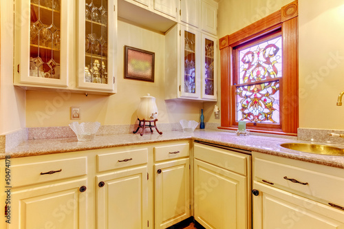 White Kitchen Pantry With Antique Cabinets And Window Buy This