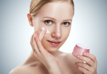 Wall Mural - skin care. happy beauty healthy girl with jar of cream