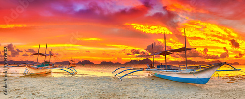 Naklejka na kafelki Boat at sunset