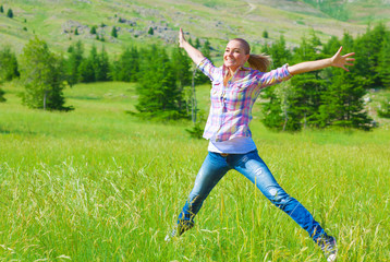 Sticker - Happy girl jumping on the field