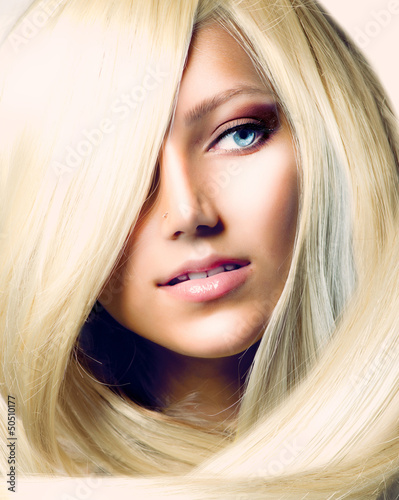 Fototapeta na wymiar Beautiful Girl with Long Blond Hair