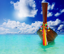 Longtail Boat On The Sea Tropical Beach