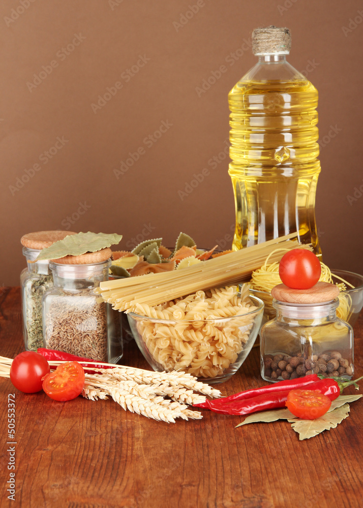 Different types of pasta, spices, tomatoes