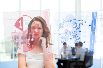 Poster - Smiling businesswoman looking at red pie chart interface