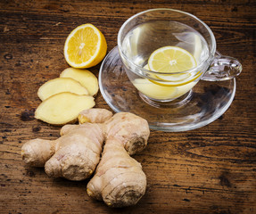 Sticker - a raw ginger on an old wooden table