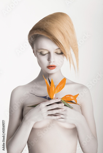 Naklejka na kafelki Bodypainting. Enigmatic Woman - Strelitzia flower. Painted Skin
