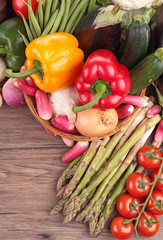 Wall Mural - healthy organic vegetables on a wood background