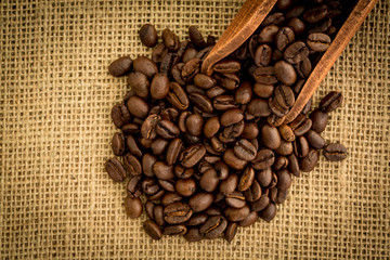 Poster - Wooden shovel with coffee beans
