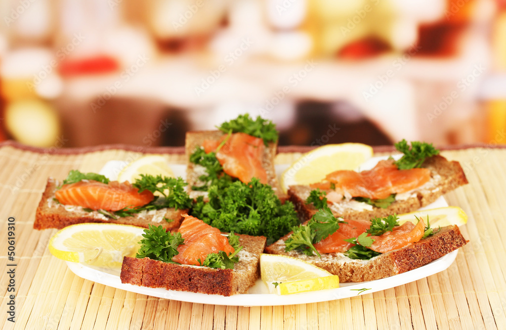 Salmon sandwich on plate,on bright background