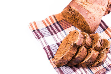 Wall Mural - Fresh sliced homemade brown bread with cereals isolated