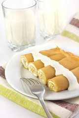 Wall Mural - Sweet crepes stuffed with cottage cheese
