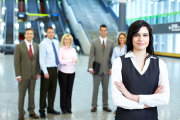 Sticker - Business woman and a group of workers.