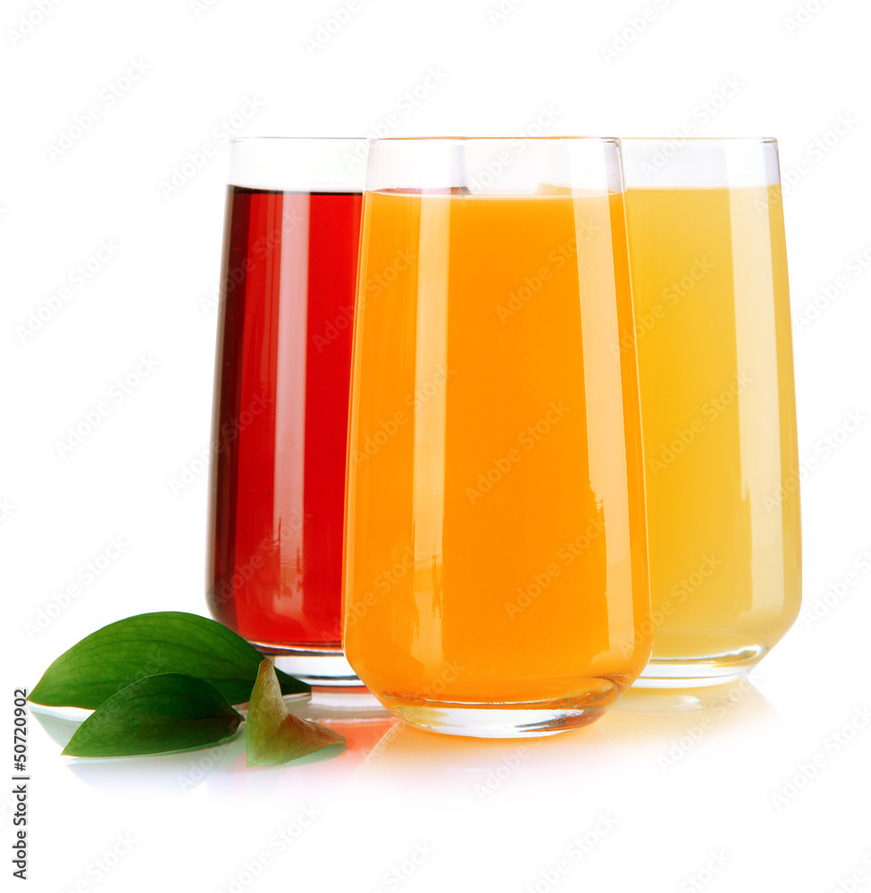 Glasses of juise and leafs isolated on white