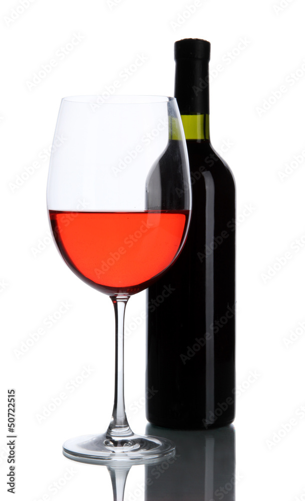 Red wine glass and bottle of wine isolated on white