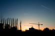 Freiburg Evening with cranes and planes