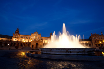 Fototapete - fountain by Plaza de Espana at night