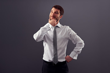 Canvas Print - businessman looking up and smiling