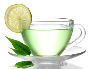 Fototapete - Transparent cup of green tea with lemon, isolated on white