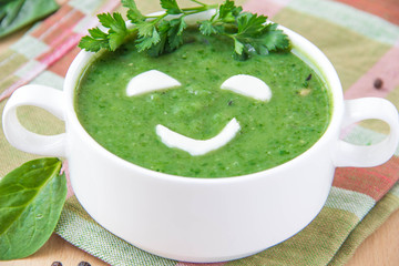 Canvas Print - Funny healthy soup with spinach for children