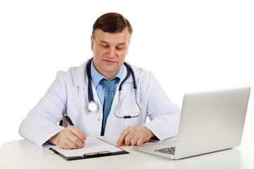 Poster - Medical doctor working at desk isolated on white