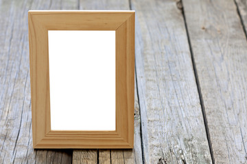 Old empty photo frame background concept on vintage planks