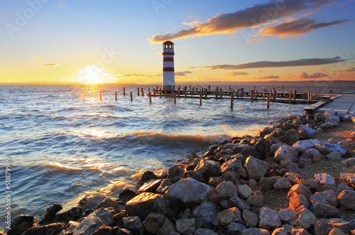 Nowoczesny obraz na płótnie Lighthouse at Lake Neusiedl at sunset - Austria