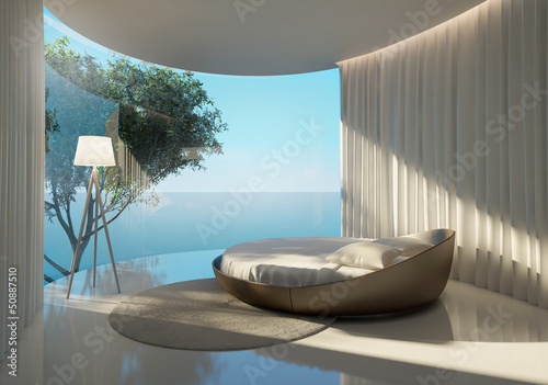 Fototapeta na wymiar Atmospheric contemporary bedroom, round bed and sea view