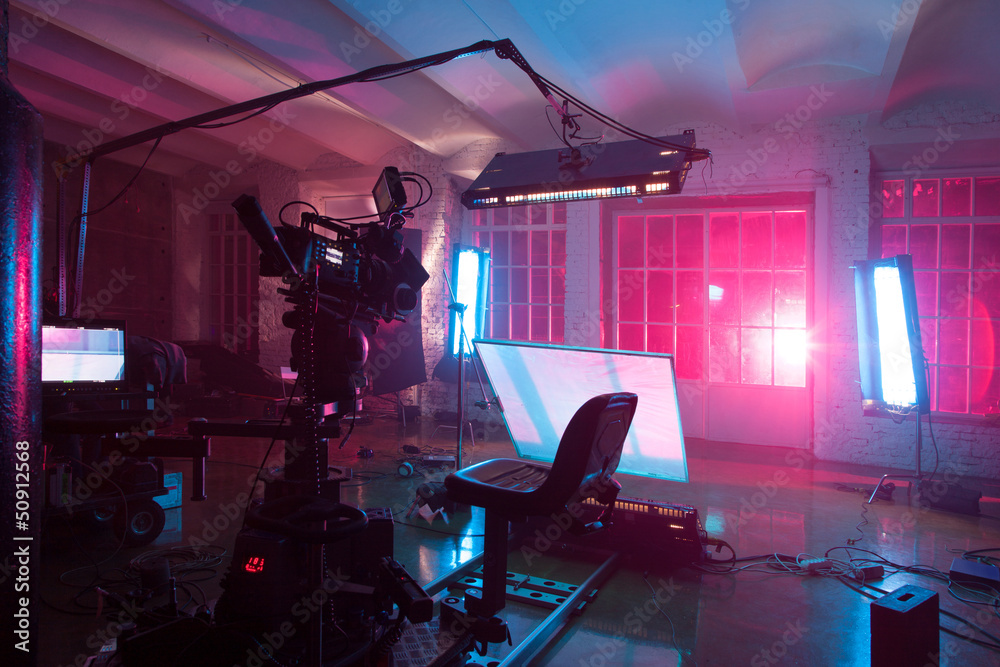 room in the purple light with equipment for a film - obrazy, fototapety, plakaty 