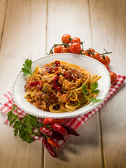 Wall Mural - pasta with fish ragout and hot chili pepper