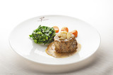 Fototapeta Sypialnia - Juicy Fillet Mignon served with Sauce and Vegetables