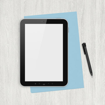 Blank digital tablet on a white desk