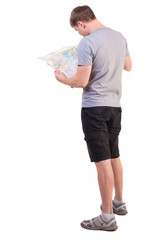 Back view of  journey  young man looking at the map