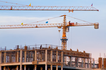 Cranes construction work in the evening.Thailand